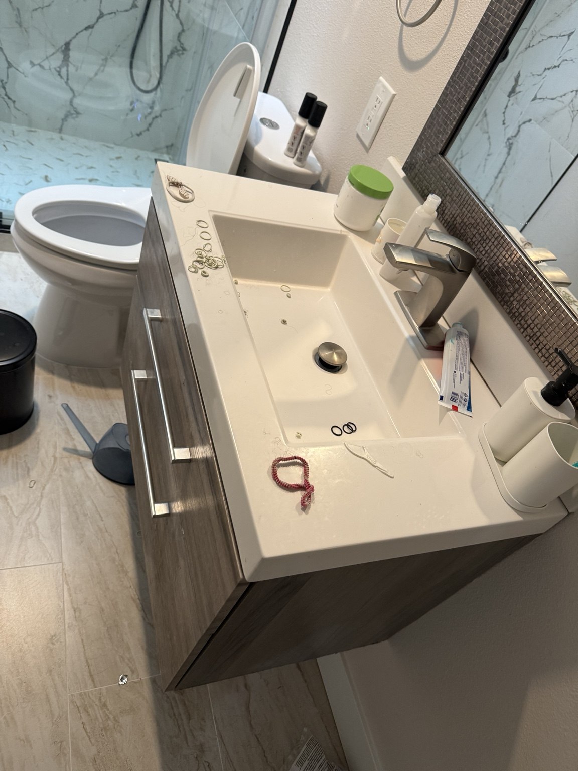 Bathroom sink & vanity before cleaning